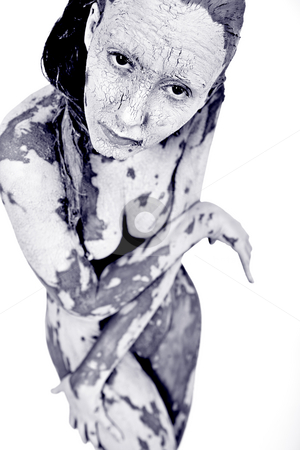 To use this stock image in your creative project, please select the size you need over to the right and click the "Add to Cart" button.
Your downloaded image will come with the Cutcaster watermark removed so don’t worry about the watermark you see on this page. Cross my Arms dressed in clay stock photo, Nude woman model covered in clay by Frenk and Danielle Kaufmann