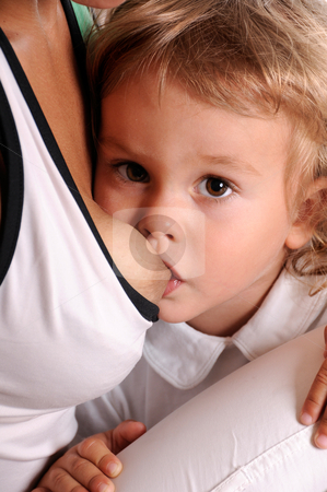 To use this stock image in your creative project, please select the size you need over to the right and click the "Add to Cart" button.
Your downloaded image will come with the Cutcaster watermark removed so don’t worry about the watermark you see on this page. Breast Feeding stock photo, Little Curly-headed Boy Breast Feeding by Valeriy Mazur