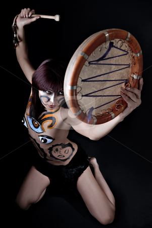 To use this stock image in your creative project, please select the size you need over to the right and click the "Add to Cart" button.
Your downloaded image will come with the Cutcaster watermark removed so don’t worry about the watermark you see on this page. Girl inflicts blows in drum stock photo, Girl with drawing on denuded tele does blows on drum by Vadim Maier
