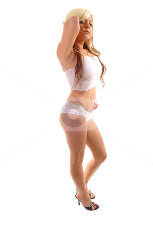 To use this stock image in your creative project, please select the size you need over to the right and click the "Add to Cart" button.
Your downloaded image will come with the Cutcaster watermark removed so don’t worry about the watermark you see on this page. Pretty young girl. stock photo, A lovely young girl in an pink top and thong, shooing her nice body
is surprised that somebody is seeing her so. by Horst Petzold