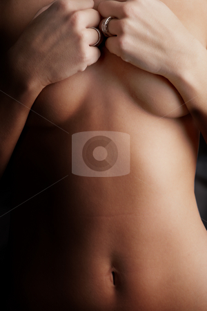 To use this stock image in your creative project, please select the size you need over to the right and click the "Add to Cart" button.
Your downloaded image will come with the Cutcaster watermark removed so don’t worry about the watermark you see on this page. Naked young woman stock photo, Naked young adult caucasion woman holding on to her breasts by Sean Nel