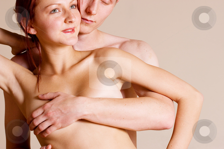 To use this stock image in your creative project, please select the size you need over to the right and click the "Add to Cart" button.
Your downloaded image will come with the Cutcaster watermark removed so don’t worry about the watermark you see on this page. Couple #18 stock photo, Topless girl standing in front of her boyfriend - Looking away by Sean Nel